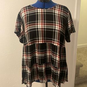 Women’s Torrid black plaid top.